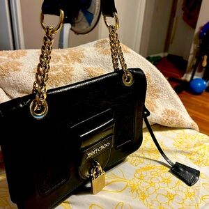 Jimmy Choo PAD LOCK BACK… 
One of a kind… 🎀👛👜😍
🚫SMOKE FREE
🚫PET FREE HOME